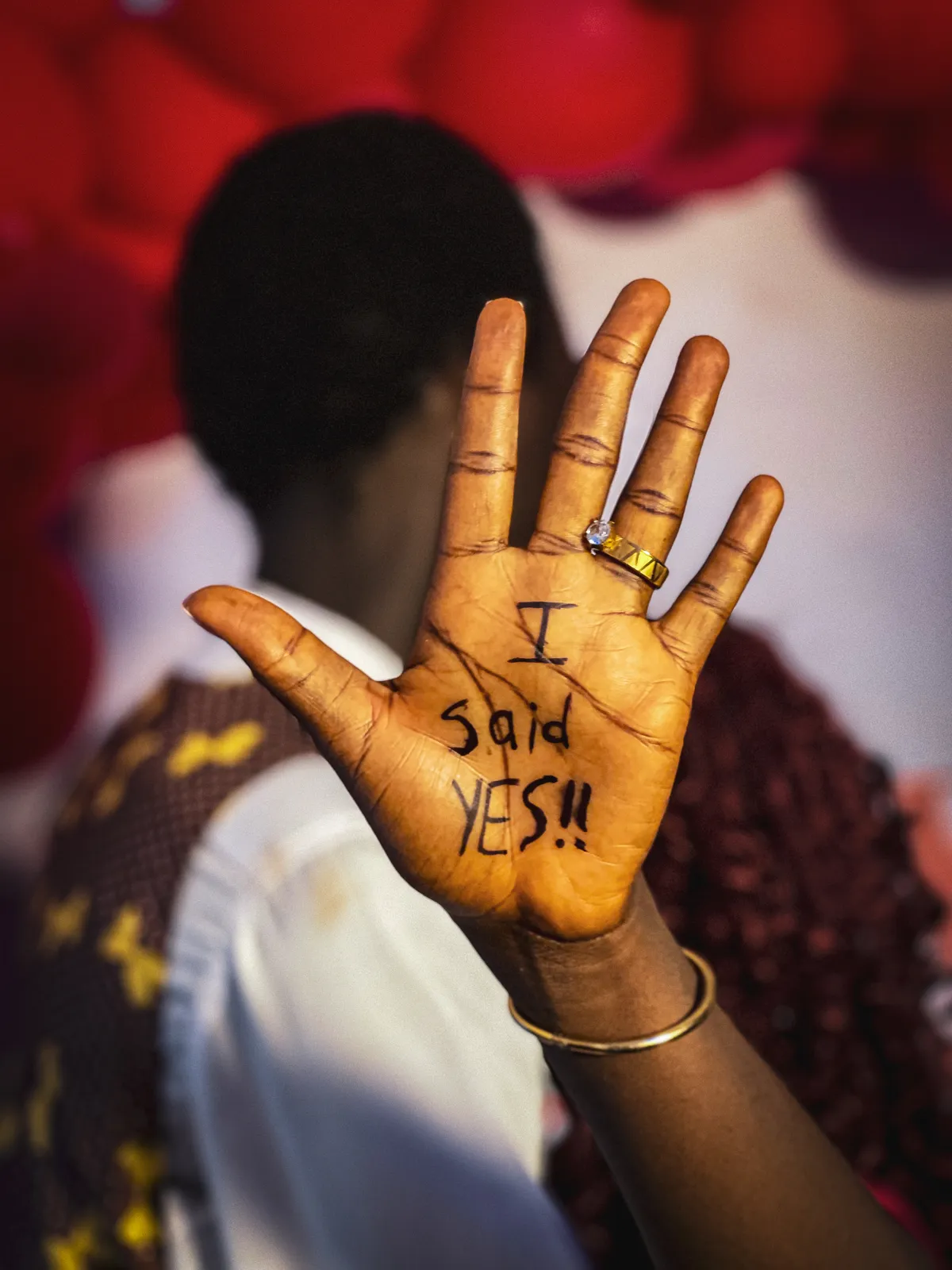 Her palm reads I said YES